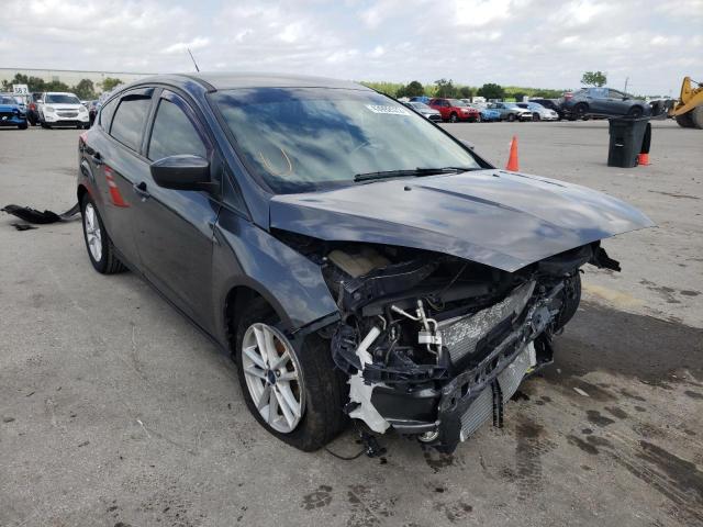 FORD FOCUS SE 2018 with VIN 1FADP3K2XJL279671 - Photo from auction