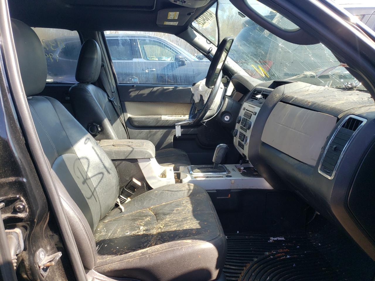Photo 5 from auction – 2009 MERCURY MARINER PR with VIN 4M2CU87779KJ14429