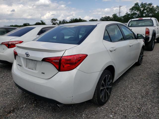 Photo 4 from auction – 2018 TOYOTA COROLLA with VIN 5YFBURHE3JP801966