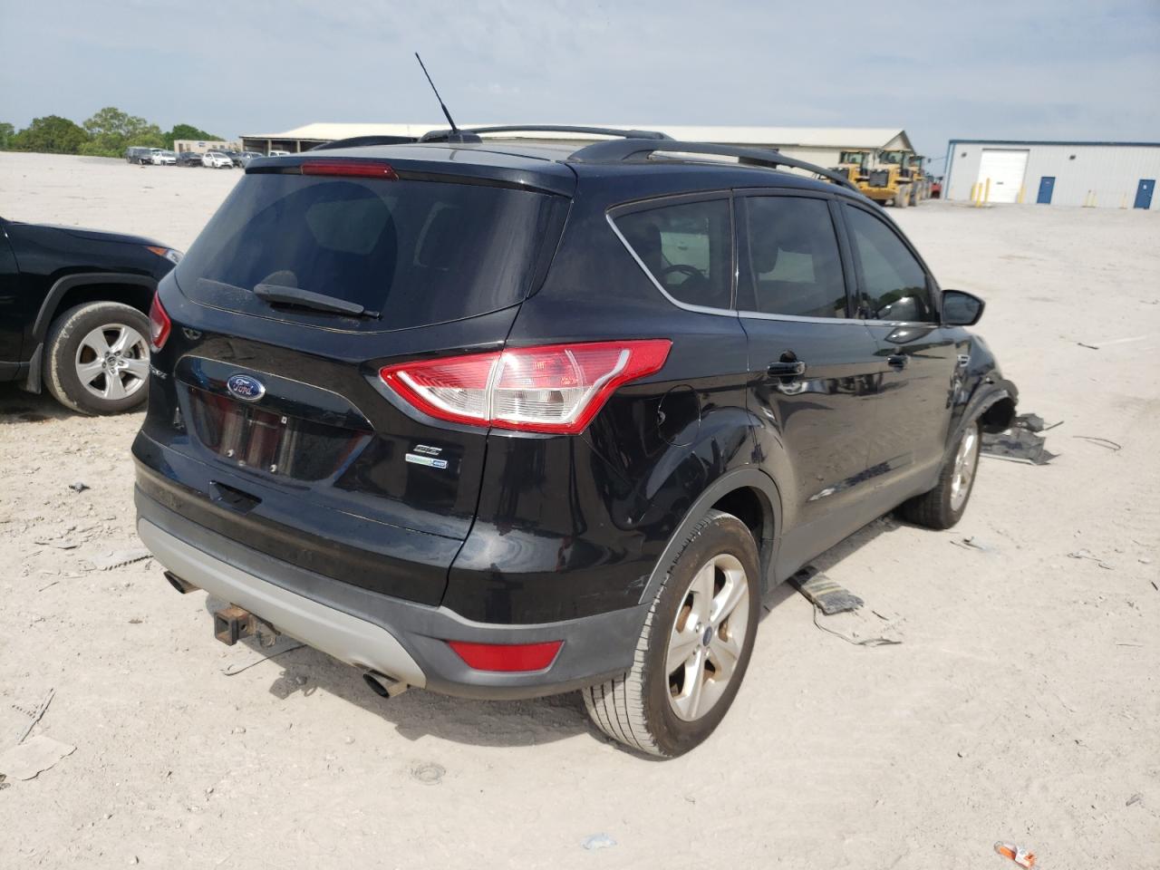 Photo 13 from auction – 2013 FORD ESCAPE SE with VIN 1FMCU9G97DUD69376