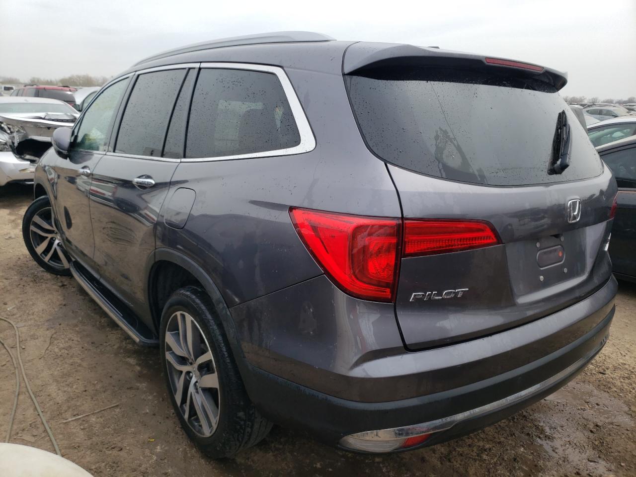 Photo 3 from auction – 2017 HONDA PILOT TOUR with VIN 5FNYF6H99HB080063