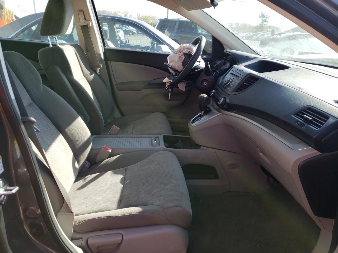 Photo 5 from auction – 2014 HONDA CR-V LX with VIN 2HKRM4H33EH694792