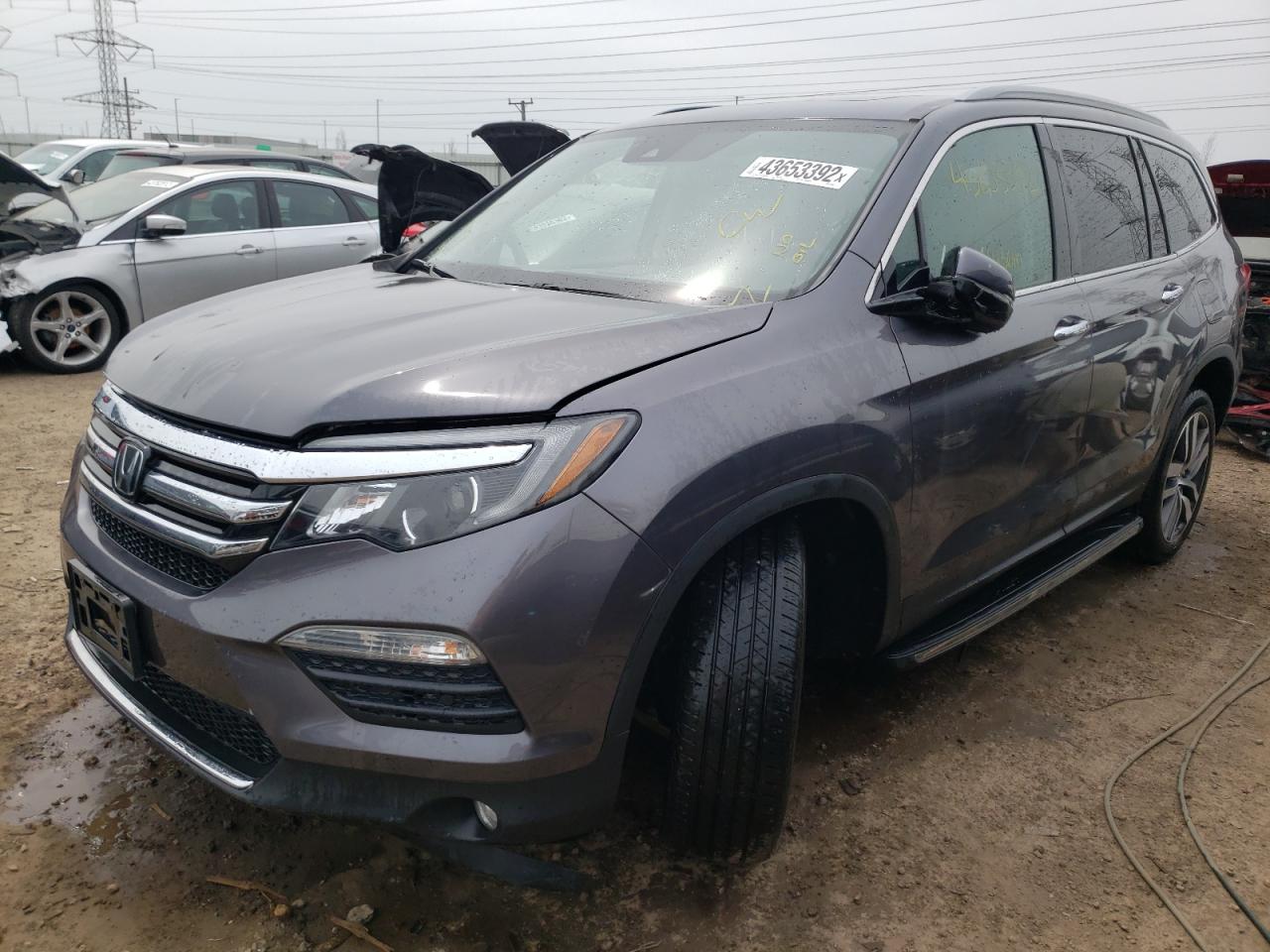 Photo 2 from auction – 2017 HONDA PILOT TOUR with VIN 5FNYF6H99HB080063