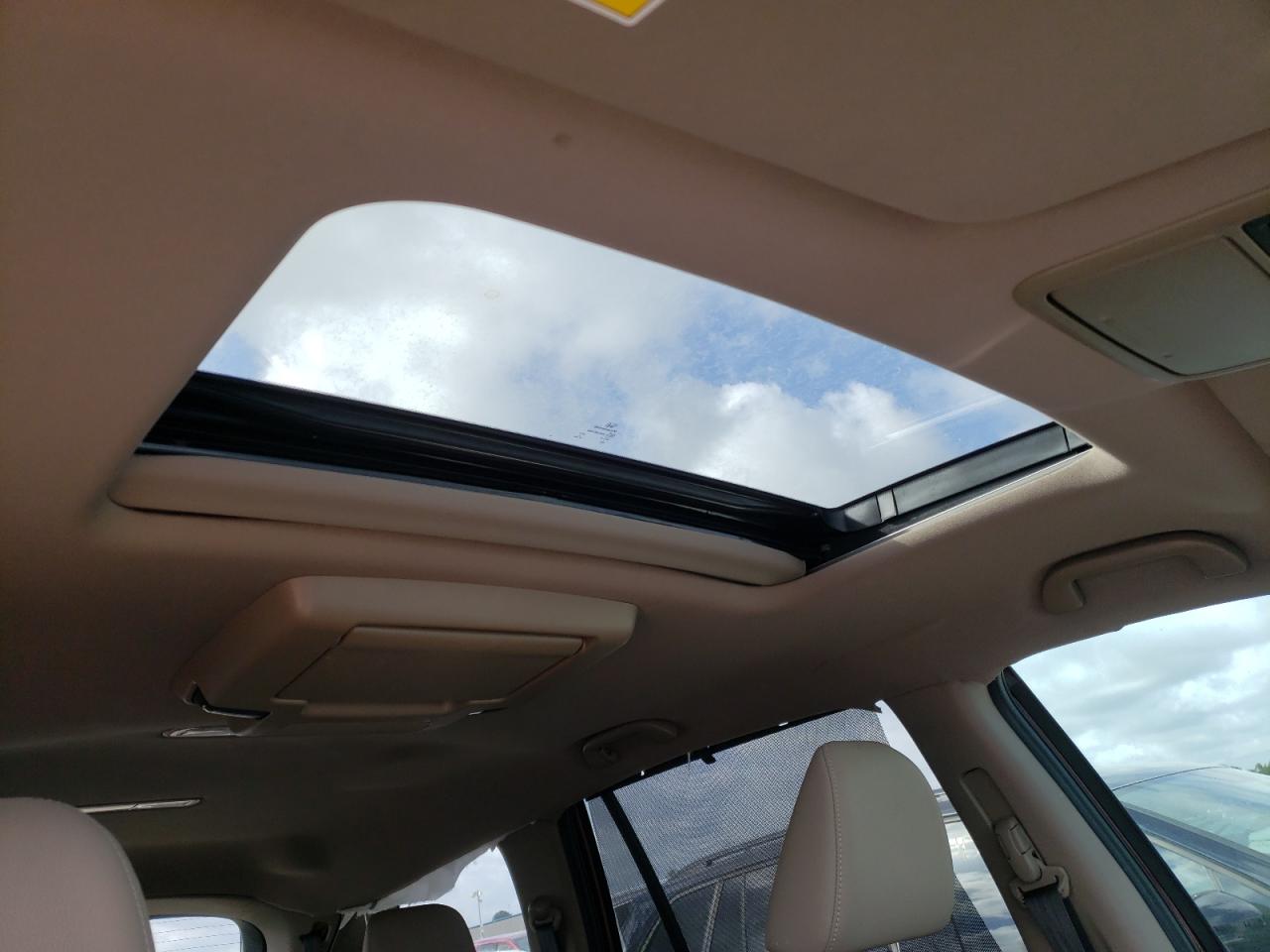 Photo 9 from auction – 2021 HONDA PILOT TOUR with VIN 5FNYF5H62MB032995