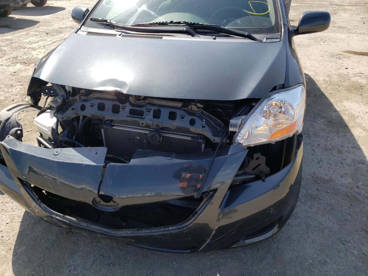 Photo 9 from auction – 2011 TOYOTA YARIS with VIN JTDBT4K39B4081493