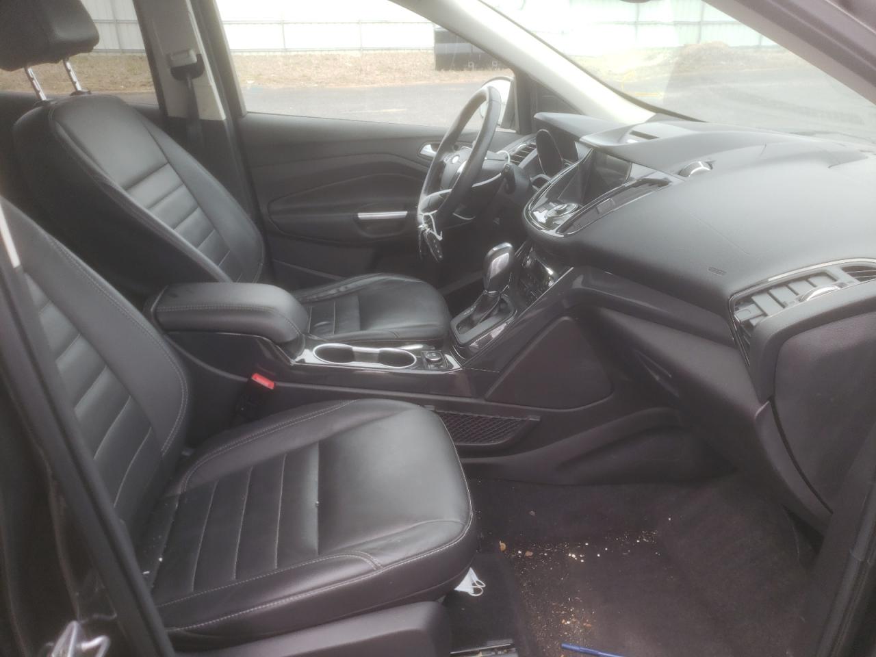 Photo 5 from auction – 2016 FORD ESCAPE TIT with VIN 1FMCU9J93GUB68202
