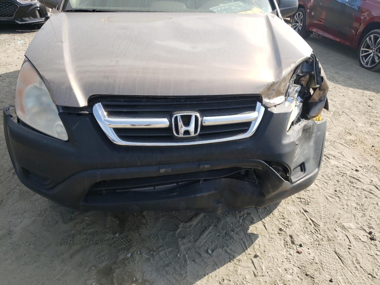 Photo 9 from auction – 2004 HONDA CR-V EX with VIN JHLRD78834C028140