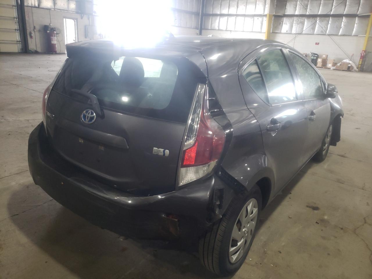 Photo 4 from auction – 2015 TOYOTA PRIUS C with VIN JTDKDTB37F1577035