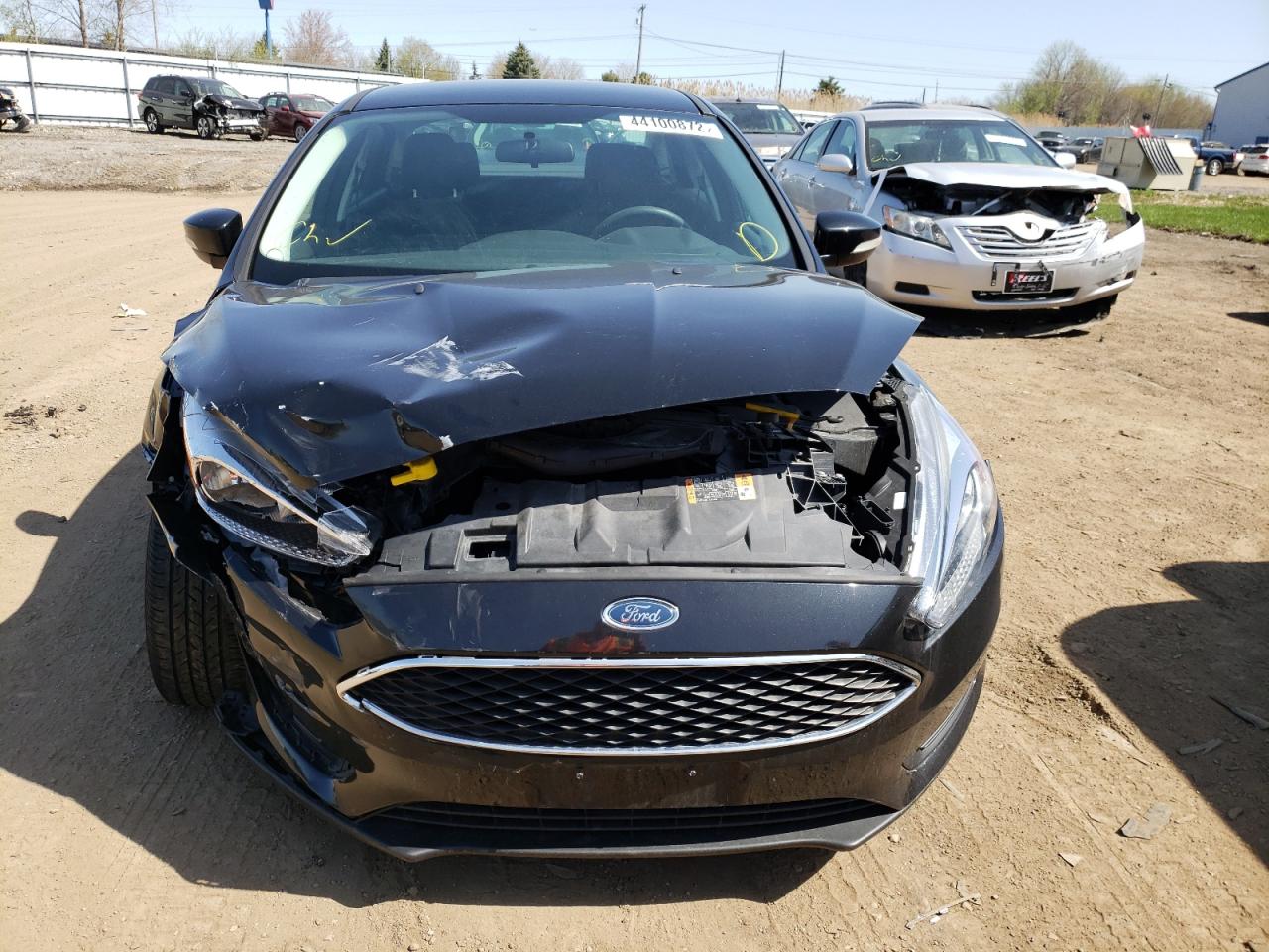 Photo 9 from auction – 2015 FORD FOCUS SE with VIN 1FADP3F25FL383096