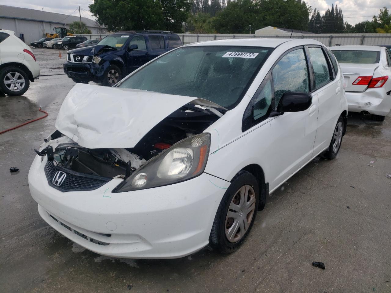 Photo 2 from auction – 2009 HONDA FIT with VIN JHMGE88209C002958