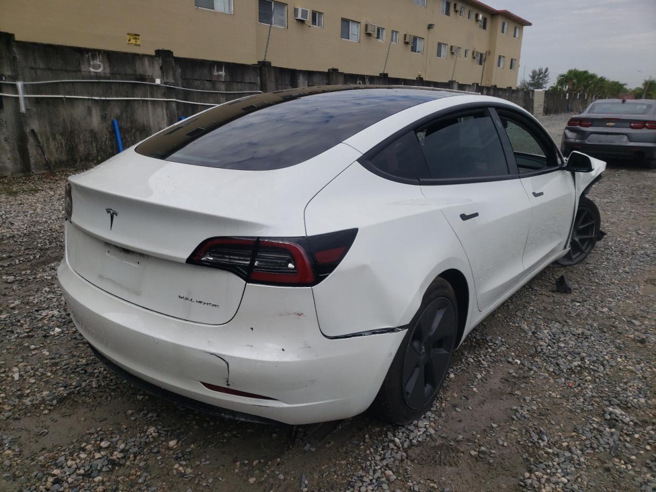 Photo 4 from auction – 2021 TESLA MODEL 3 with VIN 5YJ3E1EB5MF902147