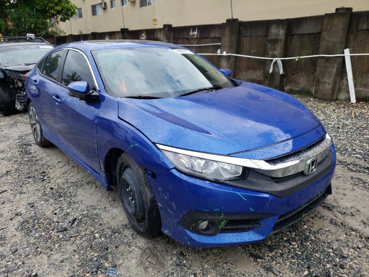 HONDA CIVIC EX 2017 with VIN 2HGFC1F30HH657379 - Photo from auction