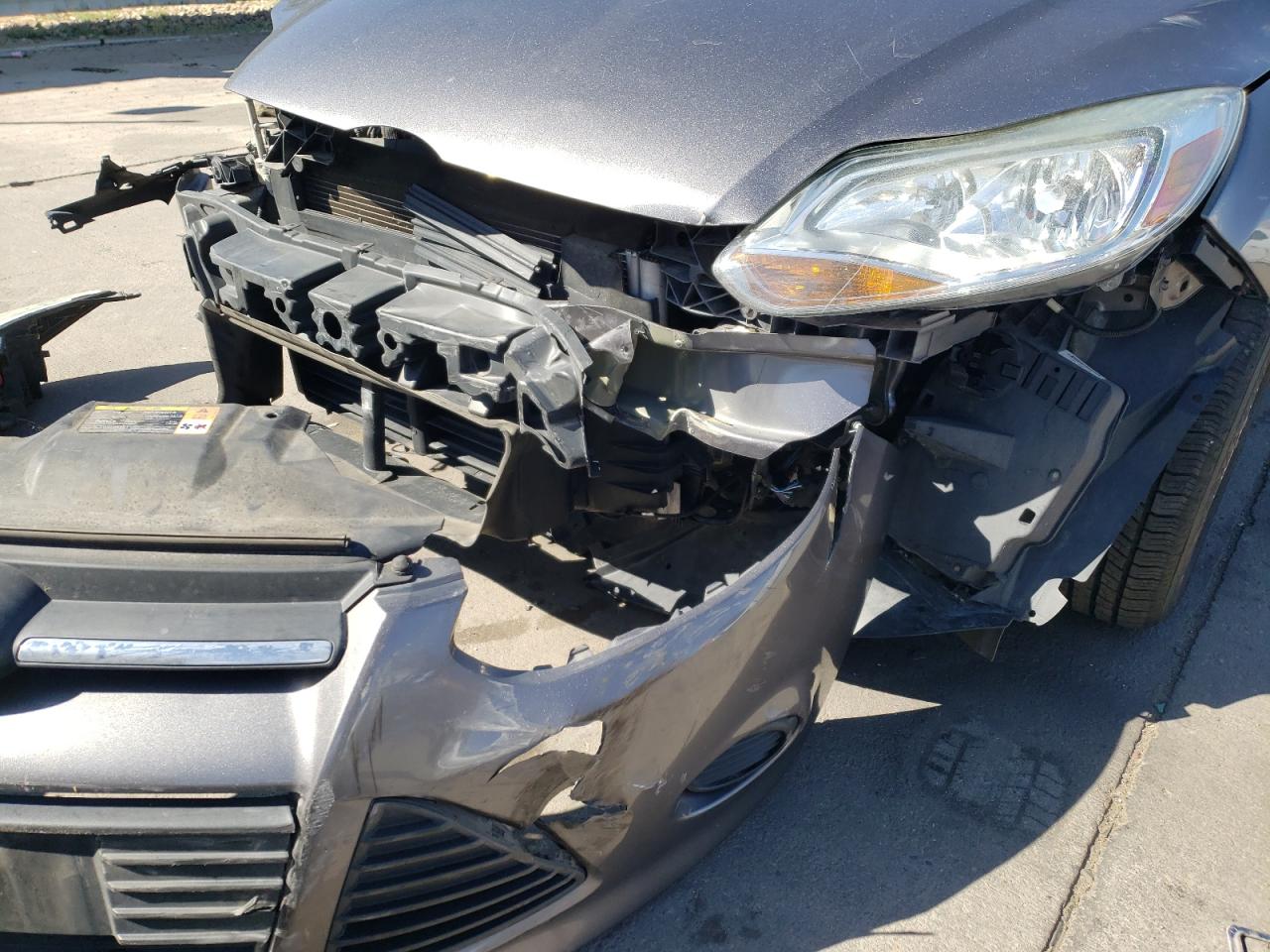 Photo 9 from auction – 2014 FORD FOCUS SE with VIN 1FADP3F27EL200683