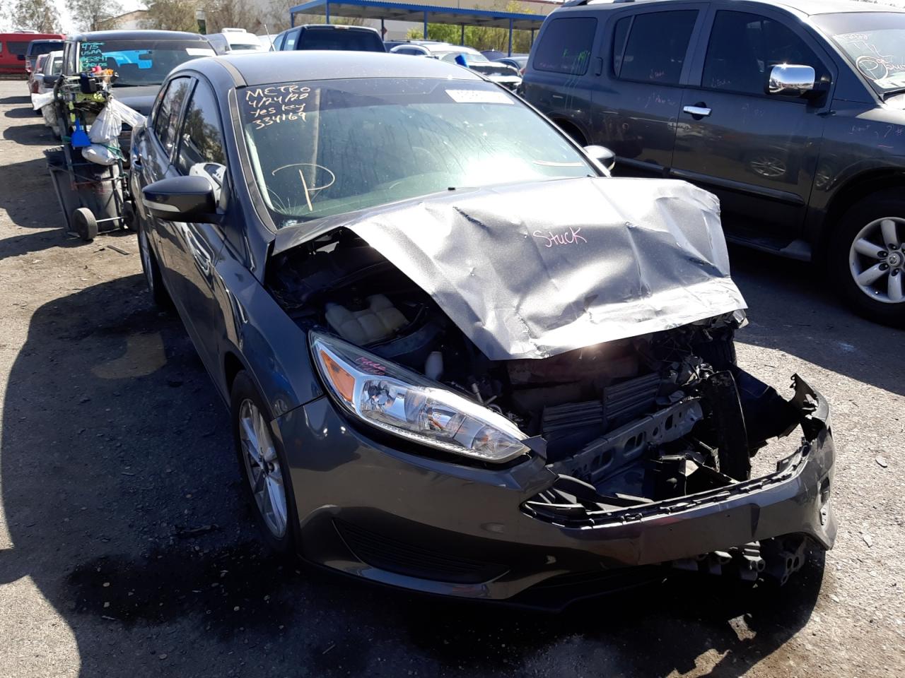 FORD FOCUS SE 2016 with VIN 1FADP3F24GL227326 - Photo from auction