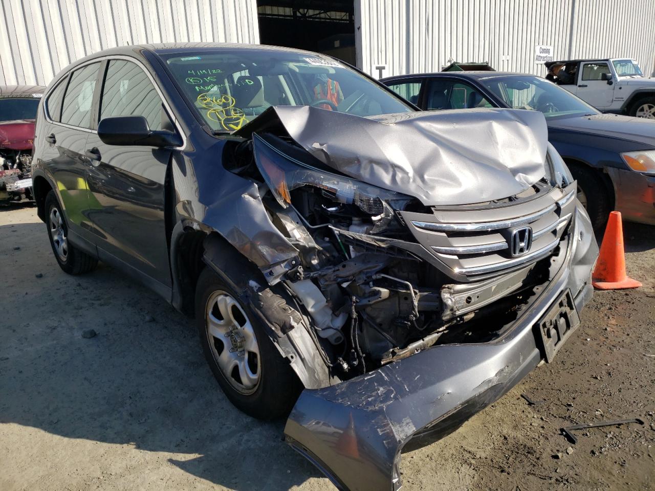 HONDA CR-V LX 2014 с VIN 2HKRM4H33EH694792 - Фото с аукциона
