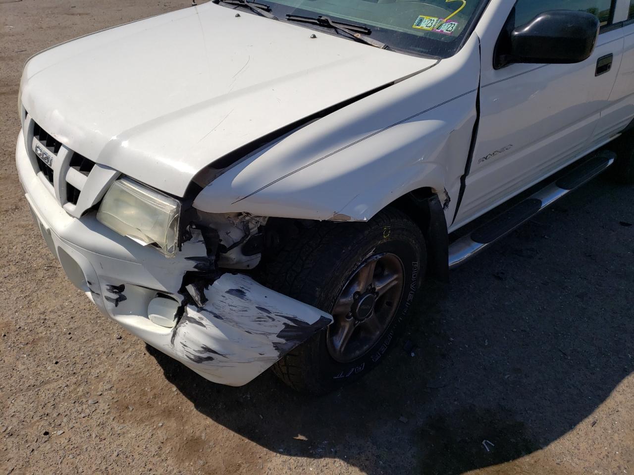 Photo 9 from auction – 2003 ISUZU RODEO S with VIN 4S2DM58W234308350