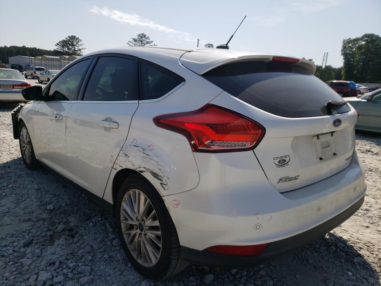 Photo 3 from auction – 2016 FORD FOCUS TITA with VIN 1FADP3N2XGL332678