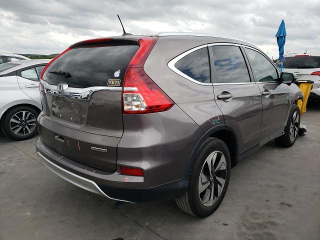Photo 4 from auction – 2015 HONDA CR-V TOURI with VIN 5J6RM3H95FL019290