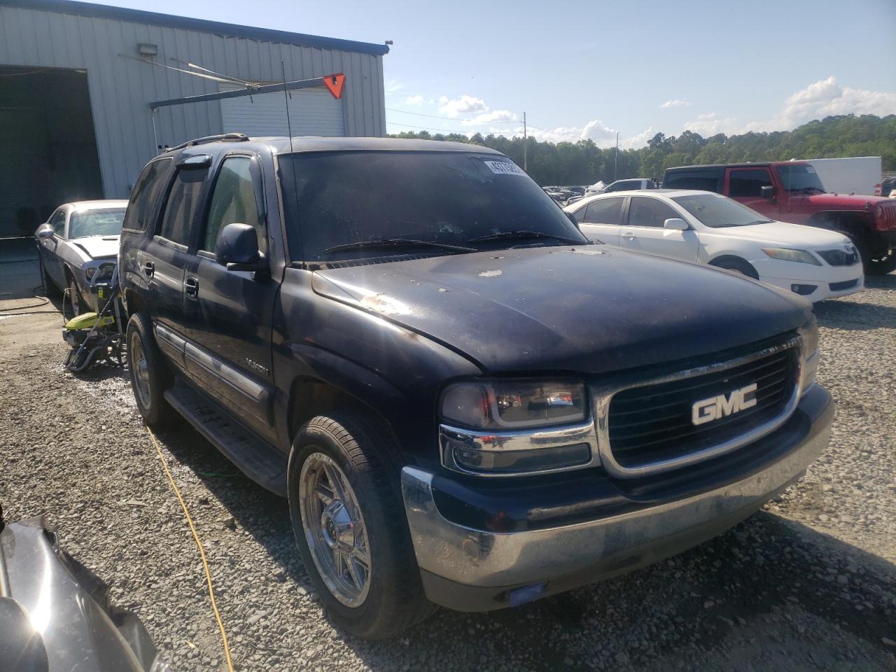 GMC YUKON 2004 with VIN 1GKEC13Z44R199069 - Photo from auction