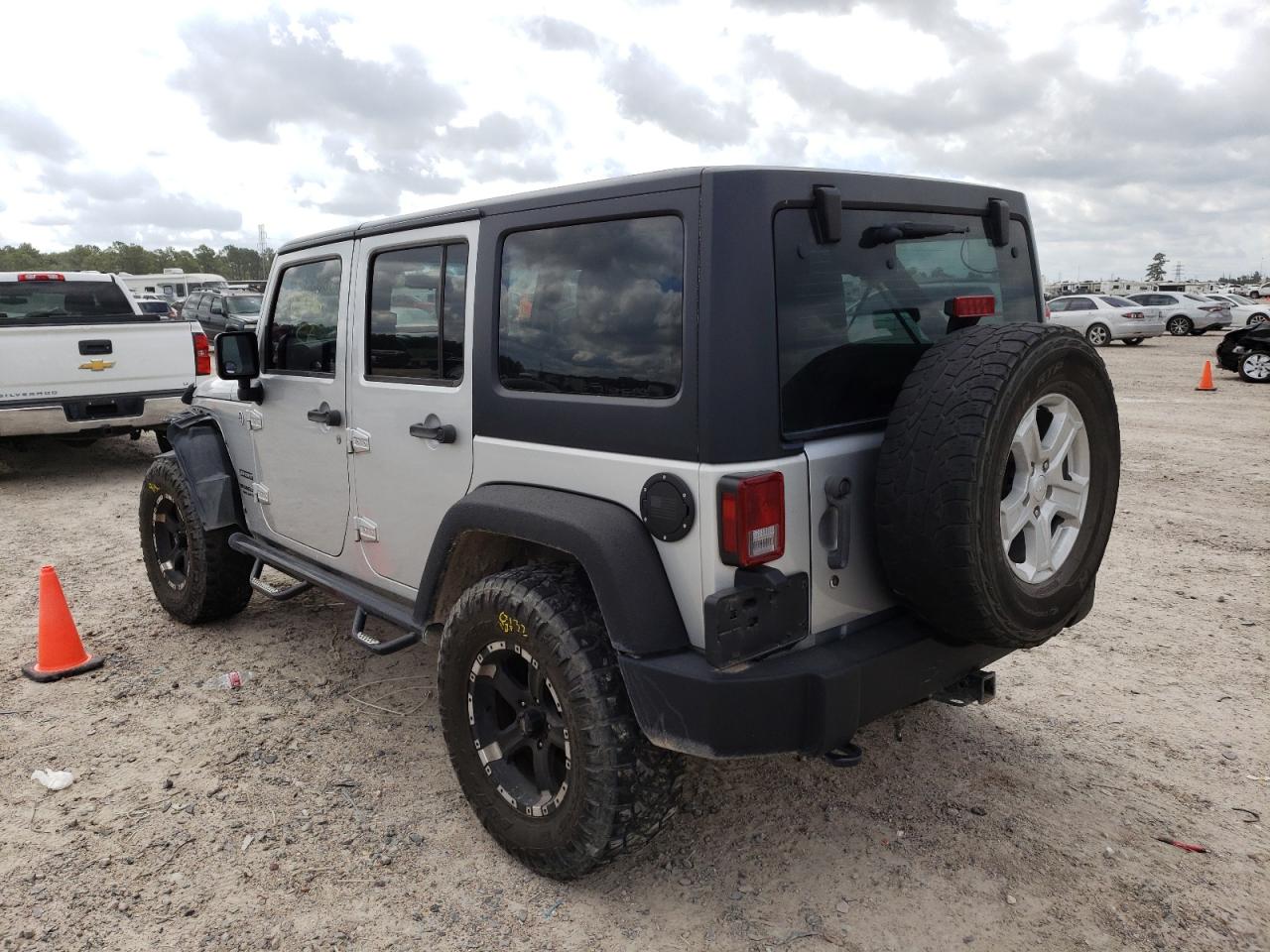 Photo 3 from auction – 2011 JEEP WRANGLER U with VIN 1J4BA3H11BL518019
