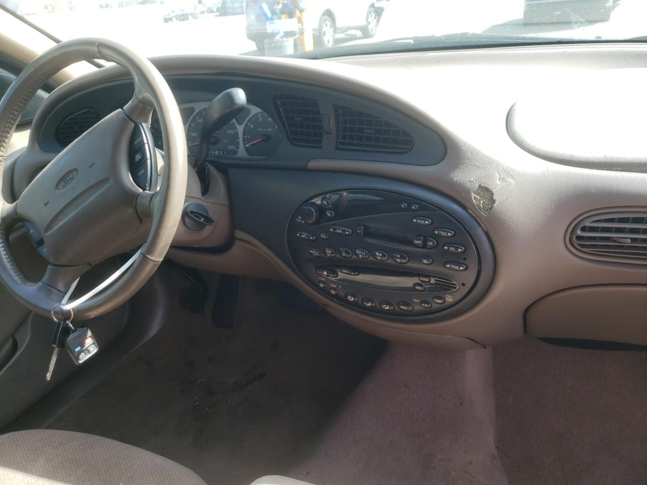 Photo 9 from auction – 1999 FORD TAURUS SE with VIN 1FAFP53S3XA222106