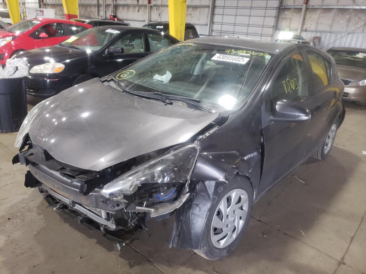 Photo 2 from auction – 2015 TOYOTA PRIUS C with VIN JTDKDTB37F1577035