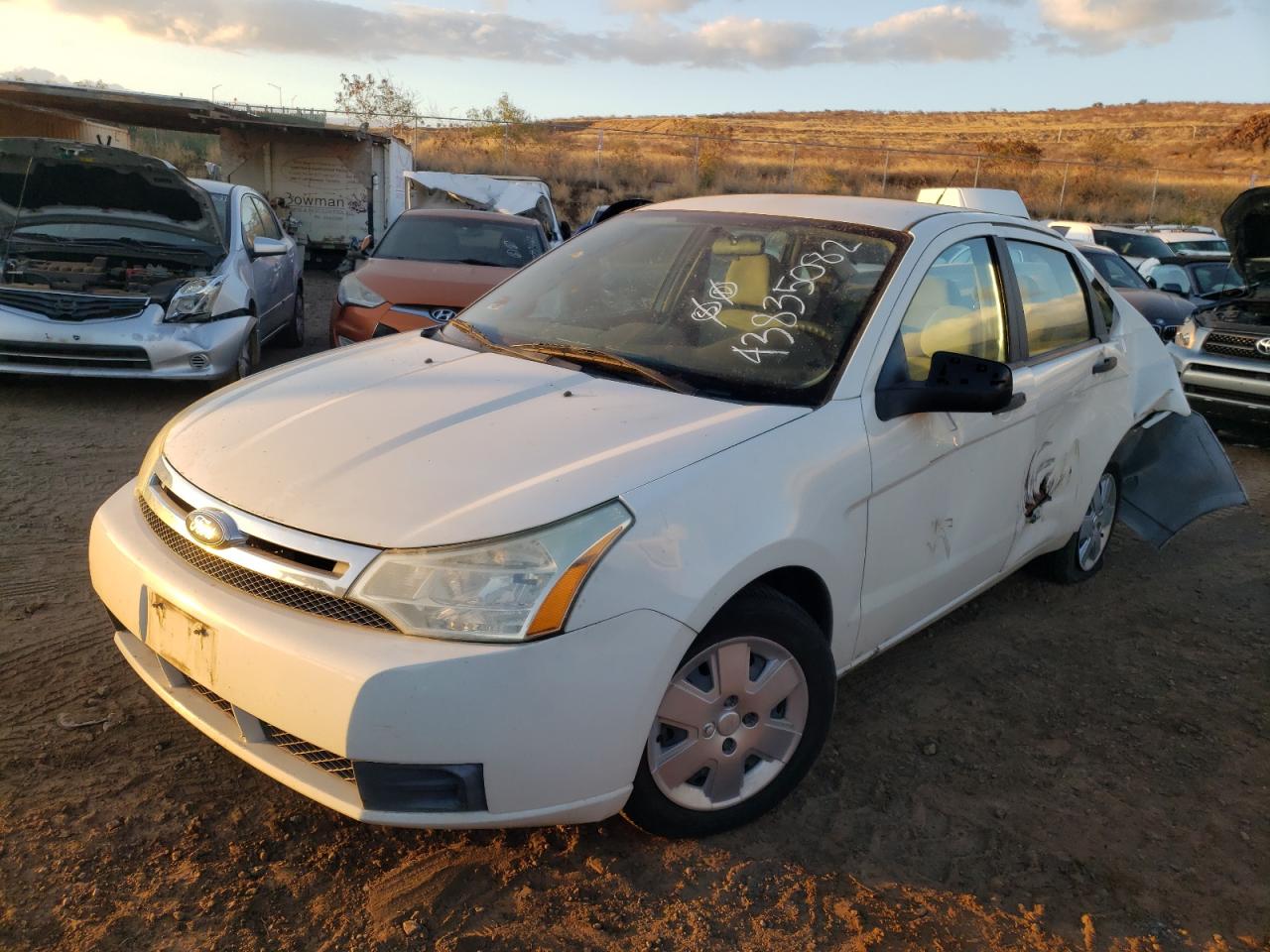 Photo 2 from auction – 2010 FORD FOCUS S with VIN 1FAHP3EN8AW141469