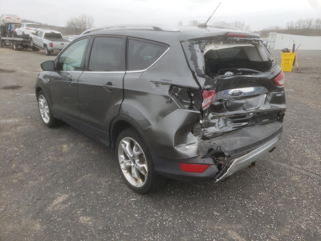Photo 3 from auction – 2016 FORD ESCAPE TIT with VIN 1FMCU9J93GUB68202