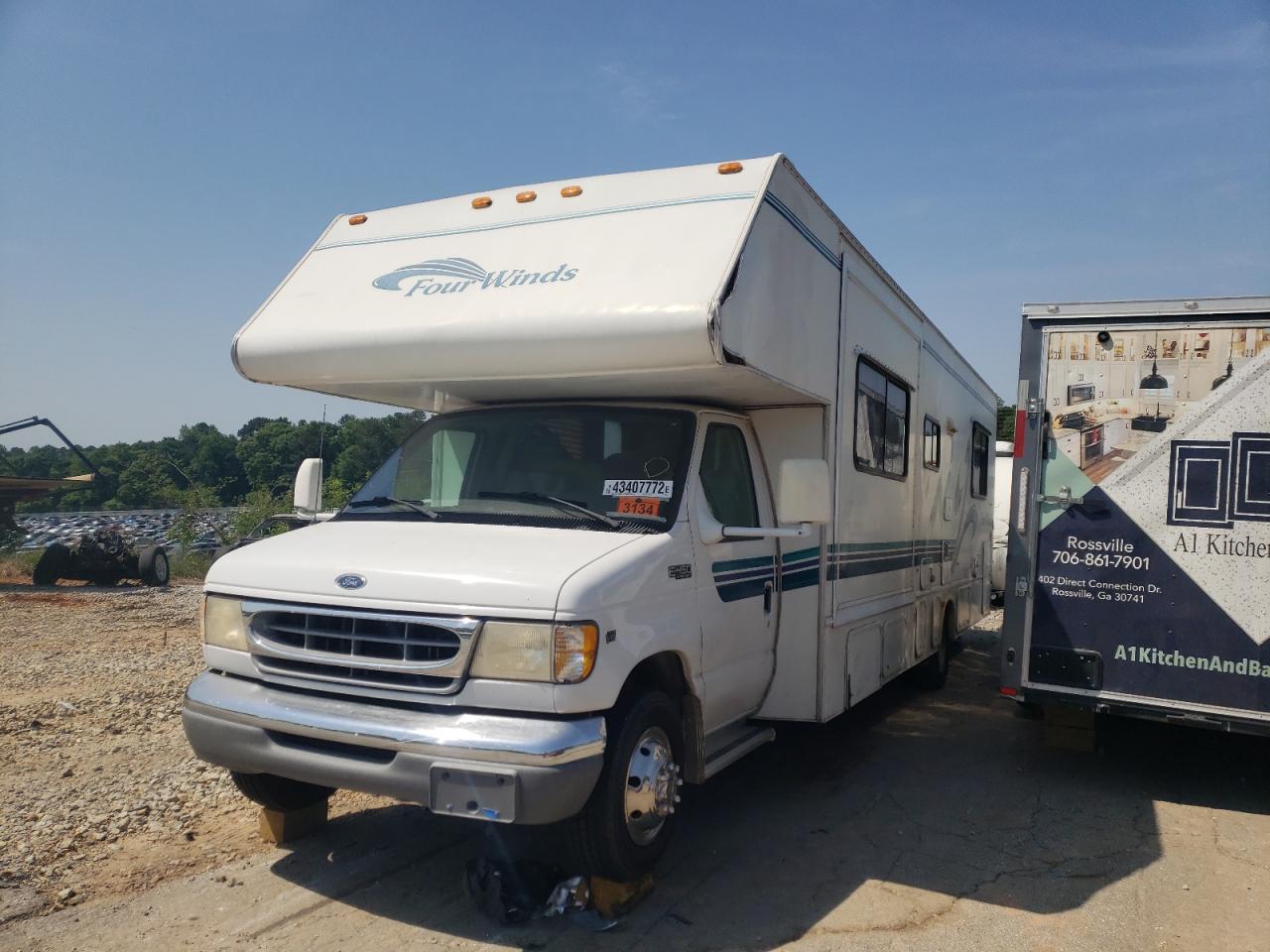 Photo 2 from auction – 1999 FOUR CHATEAU with VIN 1FDXE40SXXHB12997