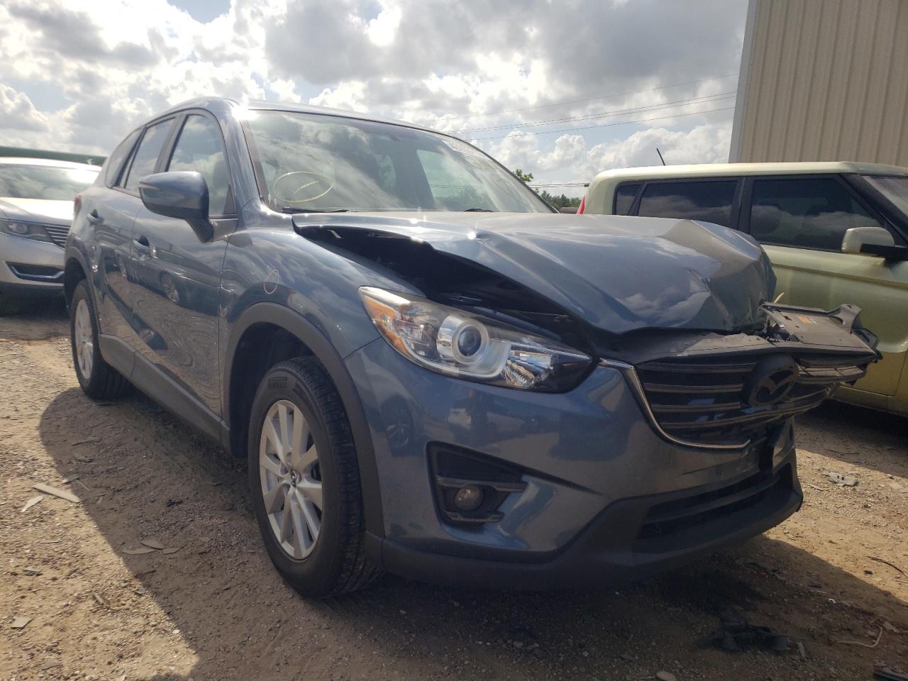 Photo 1 from auction – 2016 MAZDA CX-5 TOURI with VIN JM3KE2CY8G0658027