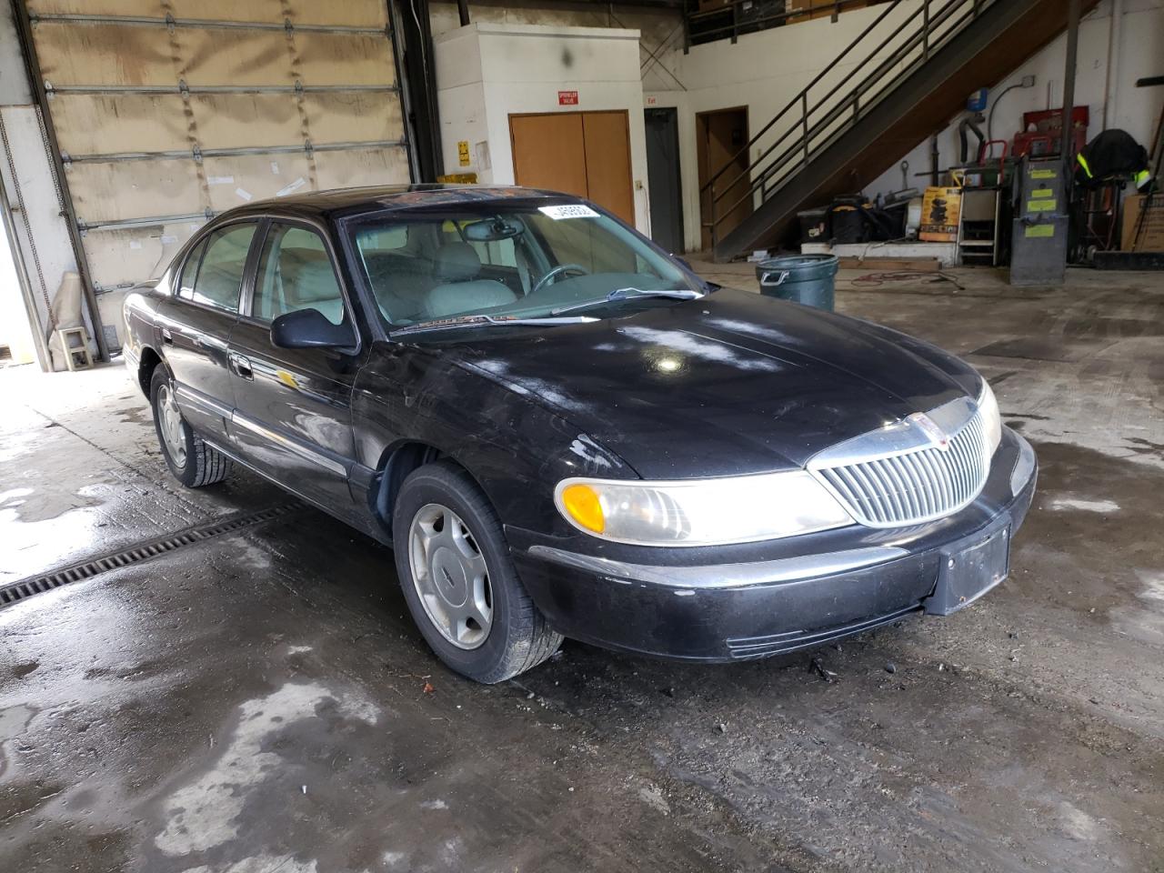 LINCOLN CONTINENTA 1999 with VIN 1LNHM97VXXY623162 - Photo from auction