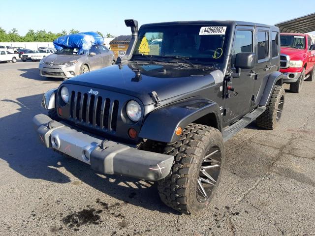 Photo 2 from auction – 2010 JEEP WRANGLER U with VIN 1J4BA5H12AL147947