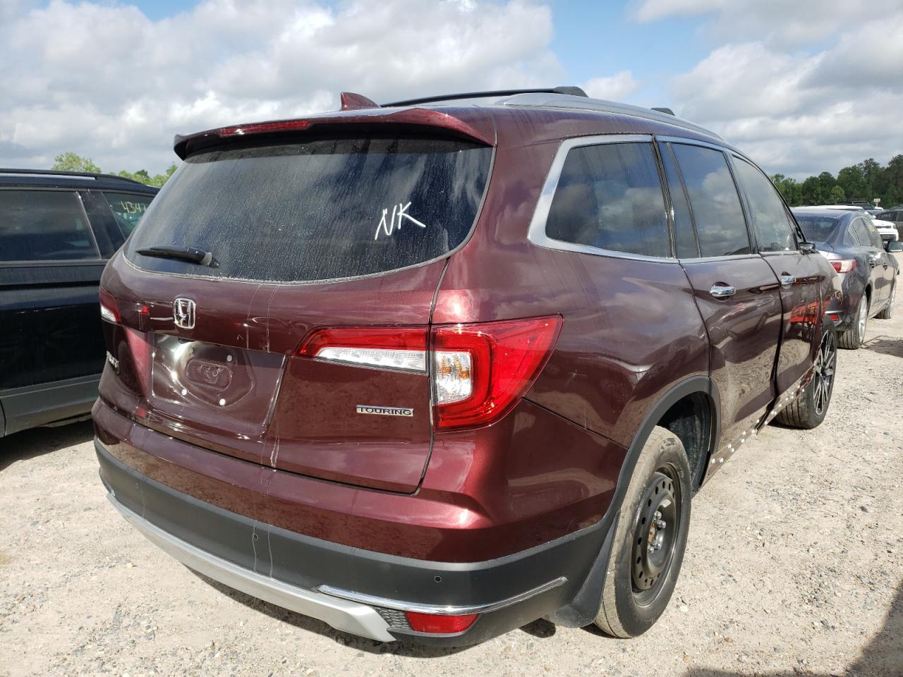 Photo 4 from auction – 2021 HONDA PILOT TOUR with VIN 5FNYF5H62MB032995