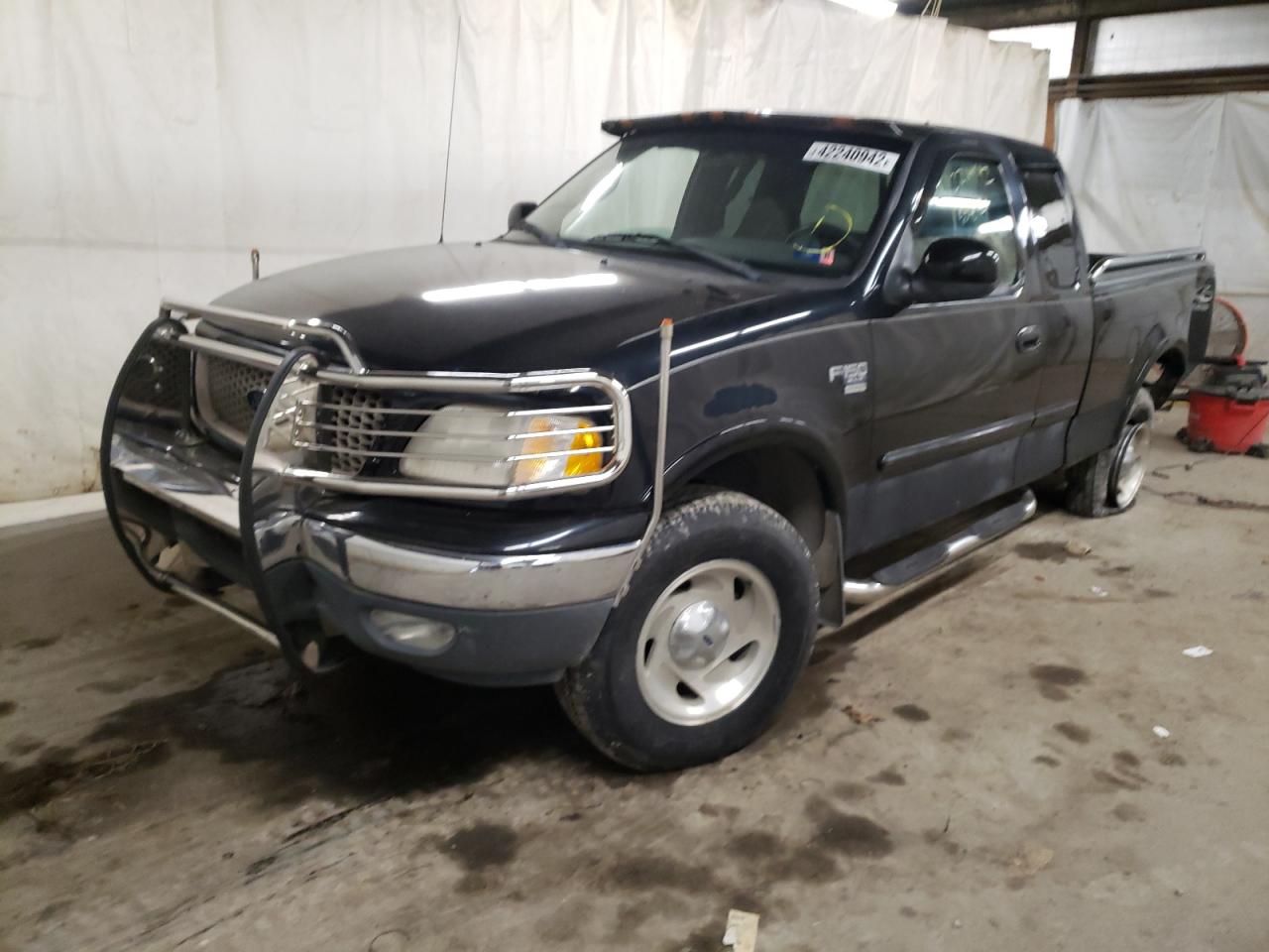 Photo 2 from auction – 2000 FORD F150 with VIN 1FTRX18L7YNA70536