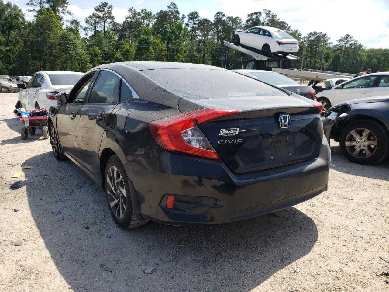 Photo 13 from auction – 2016 HONDA CIVIC EX with VIN 19XFC2F70GE053994