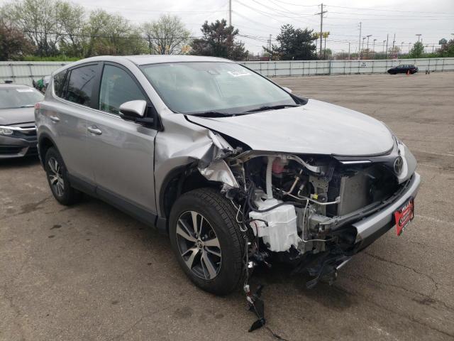 TOYOTA RAV4 ADVEN 2018 with VIN 2T3RFREV3JW801971 - Photo from auction