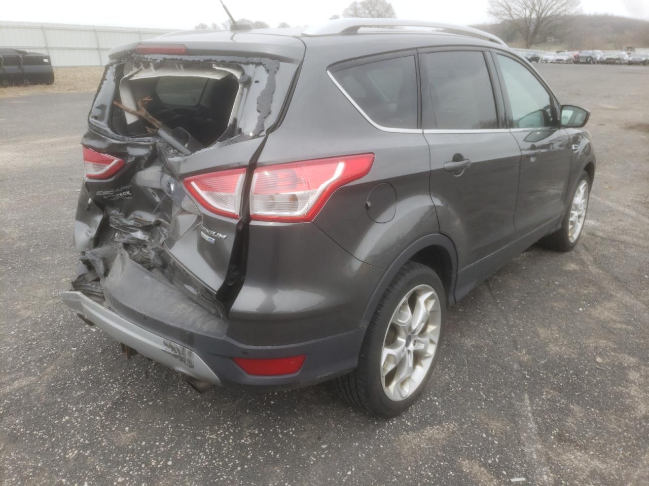 Photo 4 from auction – 2016 FORD ESCAPE TIT with VIN 1FMCU9J93GUB68202