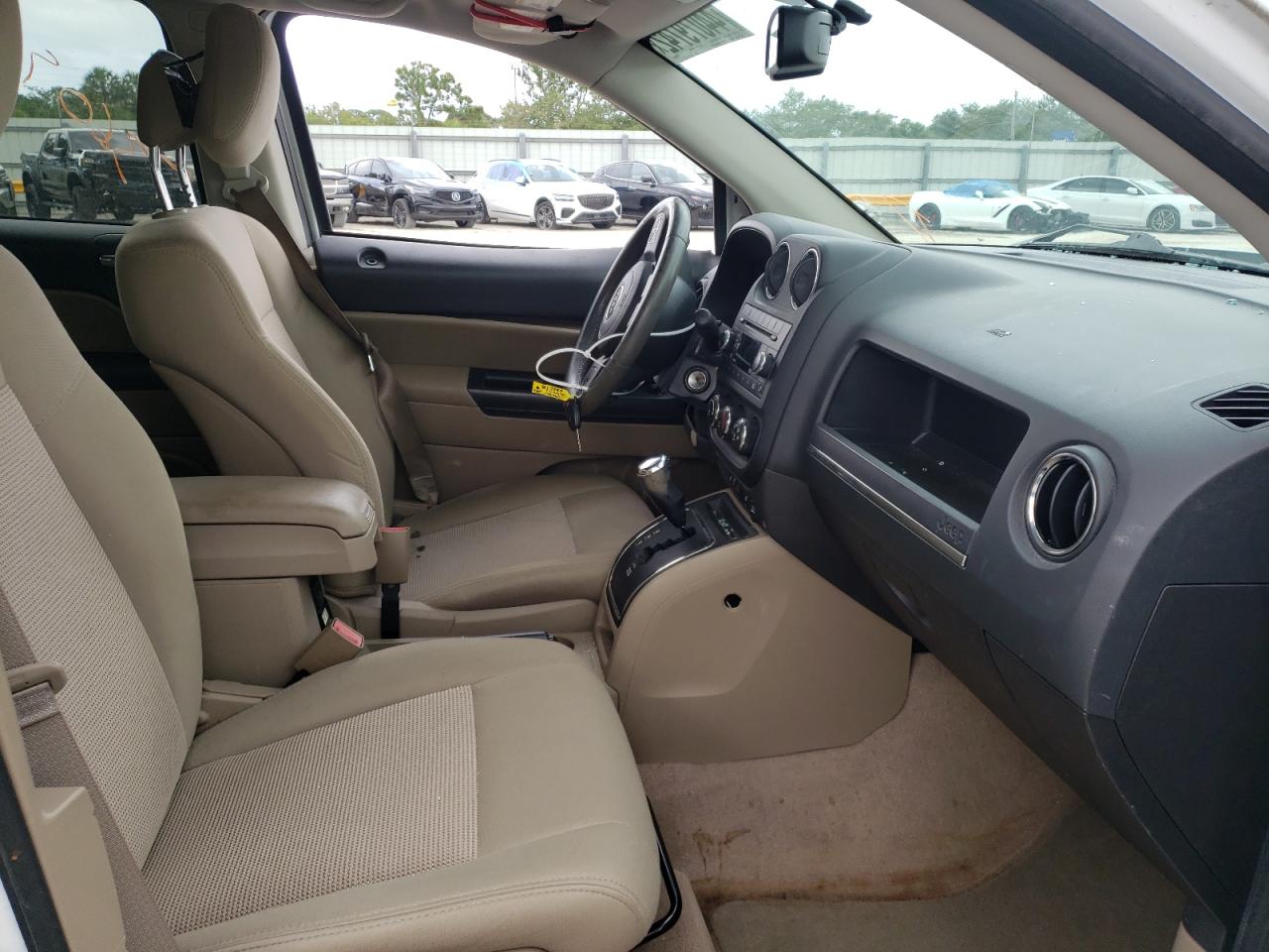 Photo 5 from auction – 2012 JEEP COMPASS LA with VIN 1C4NJCEB0CD704419