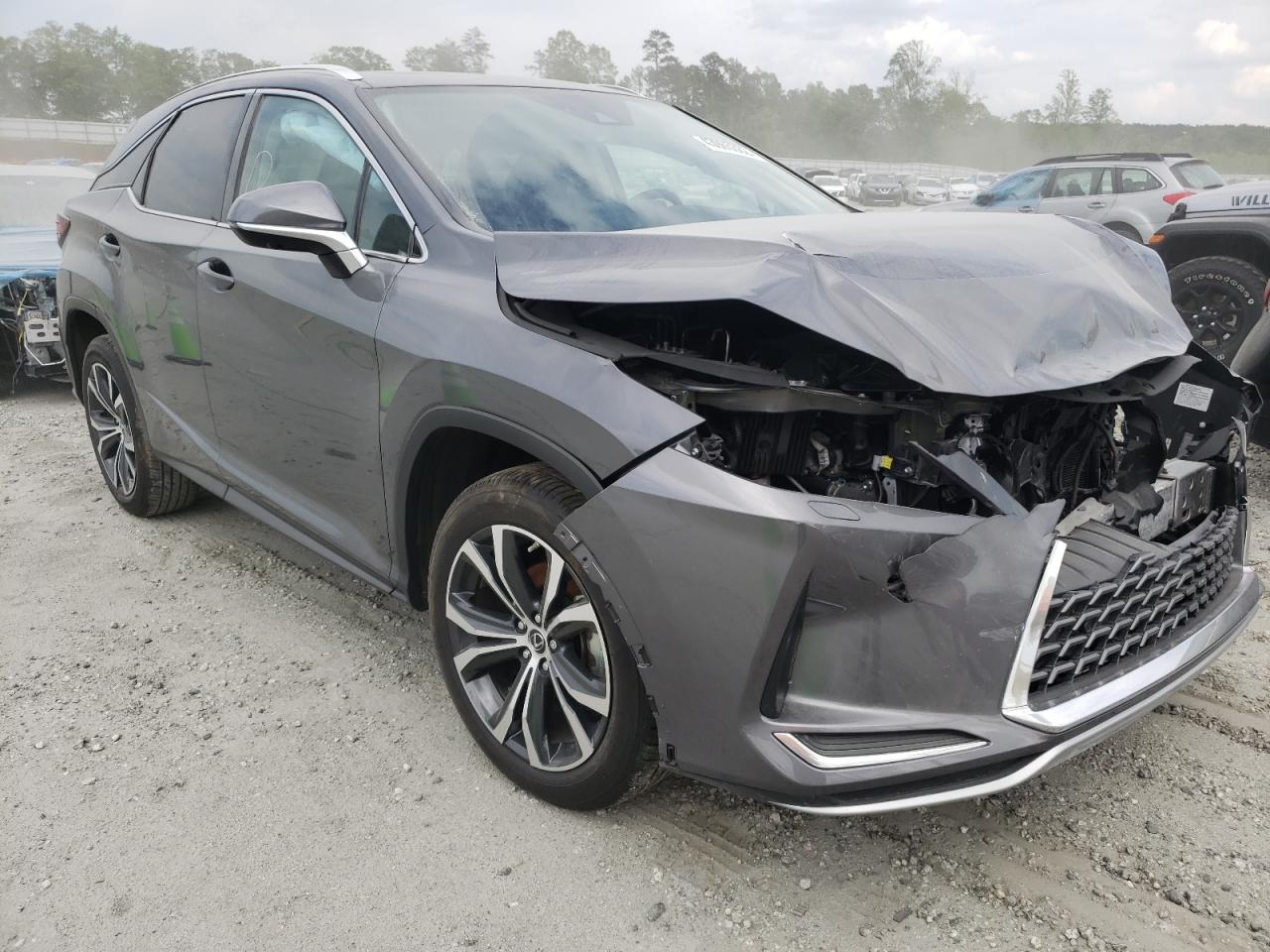 LEXUS RX 350 2022 with VIN 2T2HZMDA0NC308815 - Photo from auction