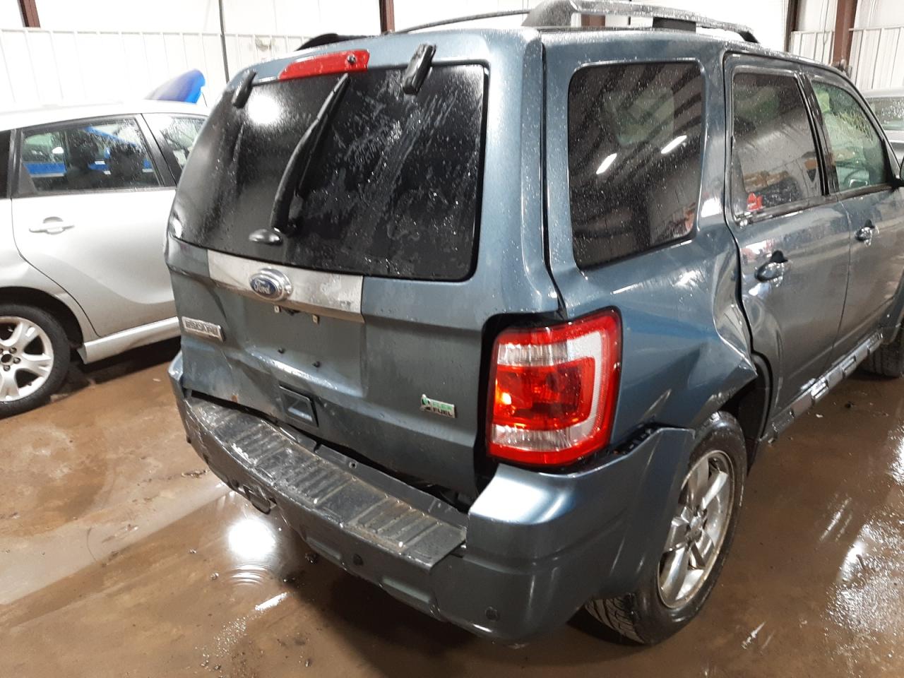 Photo 9 from auction – 2012 FORD ESCAPE LIM with VIN 1FMCU9EG6CKC23241