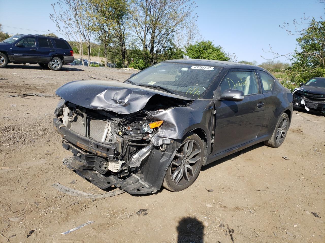 Photo 2 from auction – 2016 TOYOTA SCION TC with VIN JTKJF5C73GJ017638