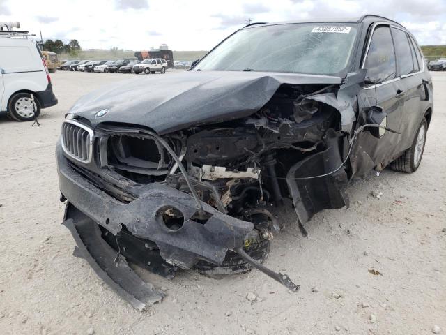 Photo 9 from auction – 2014 BMW X5 XDRIVE3 with VIN 5UXKR0C58E0H22833