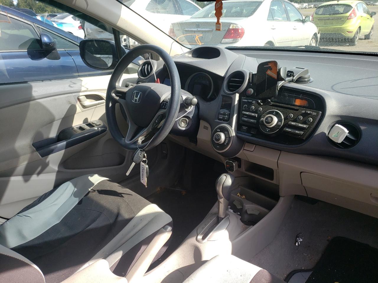 Photo 9 from auction – 2010 HONDA INSIGHT EX with VIN JHMZE2H77AS033149
