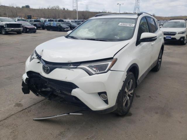 Photo 2 from auction – 2017 TOYOTA RAV4 XLE with VIN JTMRFREV0HD208155