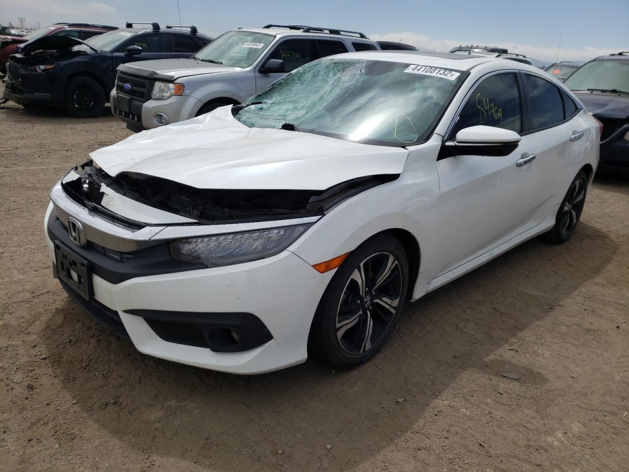 Photo 2 from auction – 2017 HONDA CIVIC TOUR with VIN 19XFC1F91HE025344