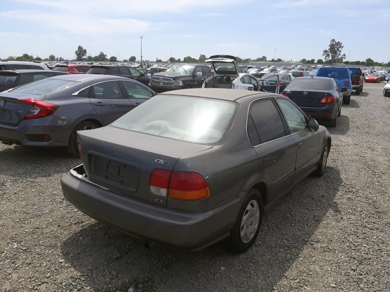 Photo 4 from auction – 1997 HONDA CIVIC EX with VIN JHMEJ8647VS005198