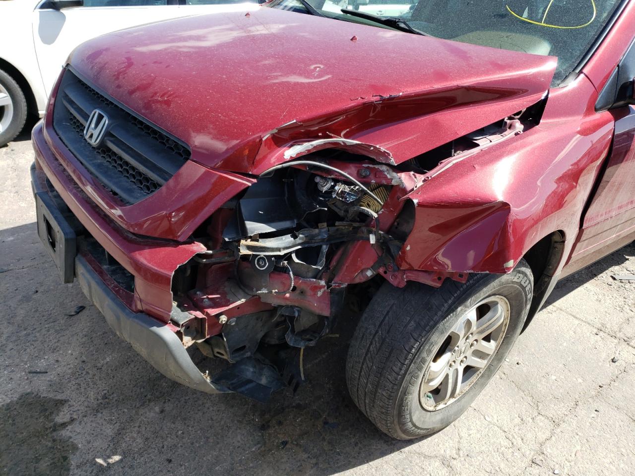 Photo 9 from auction – 2004 HONDA PILOT EX with VIN 2HKYF18464H502809