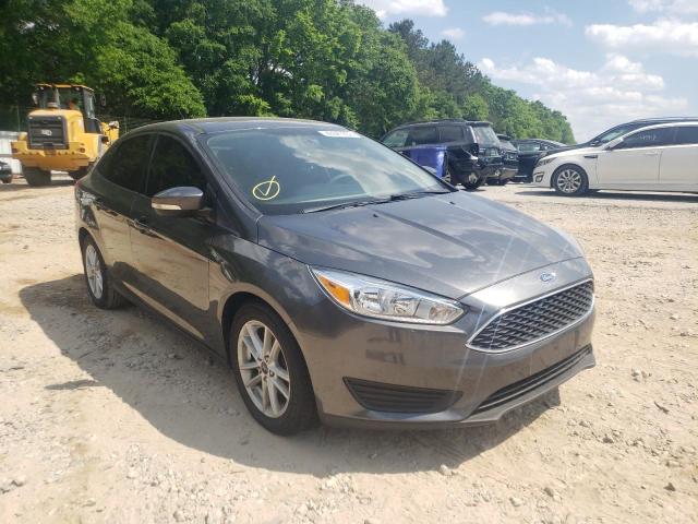 FORD FOCUS SE 2016 with VIN 1FADP3F22GL389830 - Photo from auction