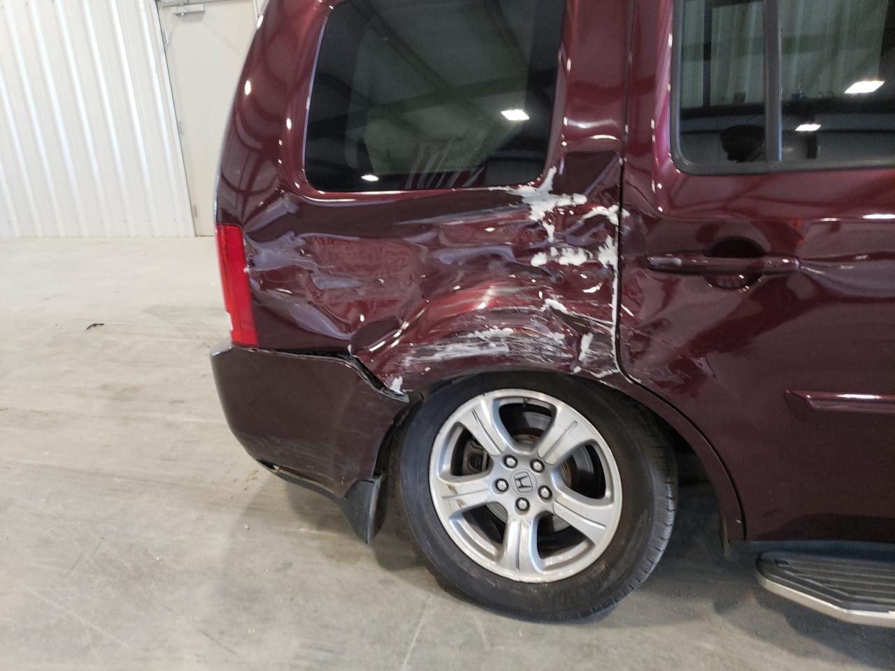 Photo 9 from auction – 2014 HONDA PILOT EXLN with VIN 5FNYF3H78EB009719