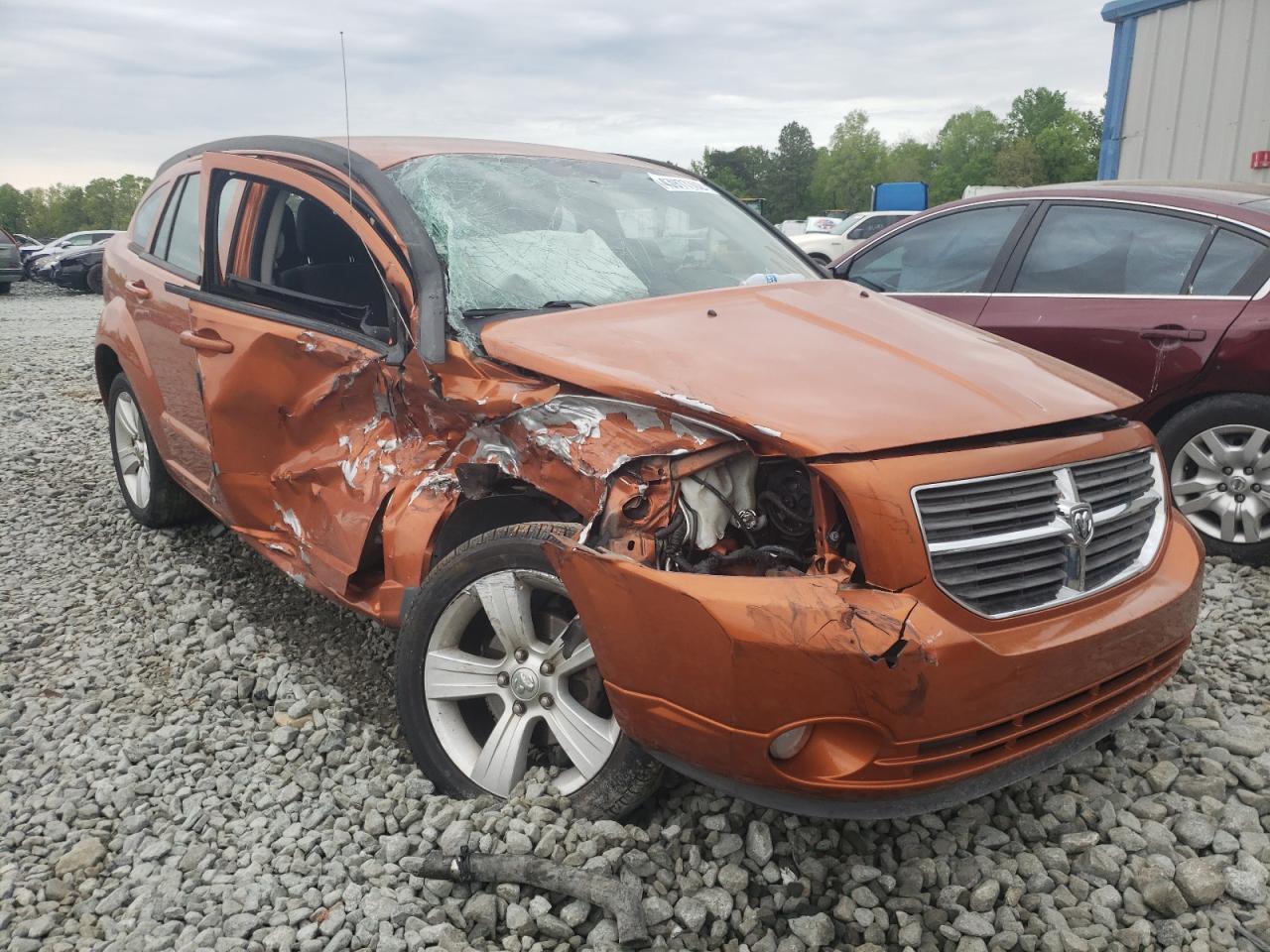 DODGE CALIBER MA 2011 with VIN 1B3CB3HA4BD157176 - Photo from auction